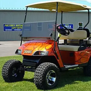 ezgo txt golf cart with jakes inch spindle lift kit installed and inch tall wheels and tires webp